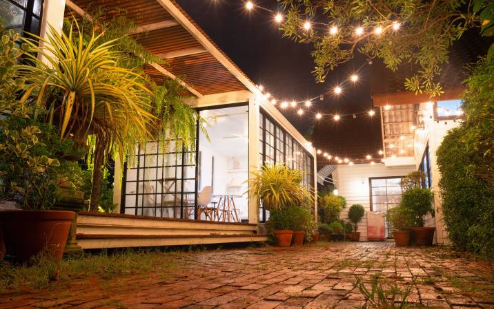 garden room with exterior string lights