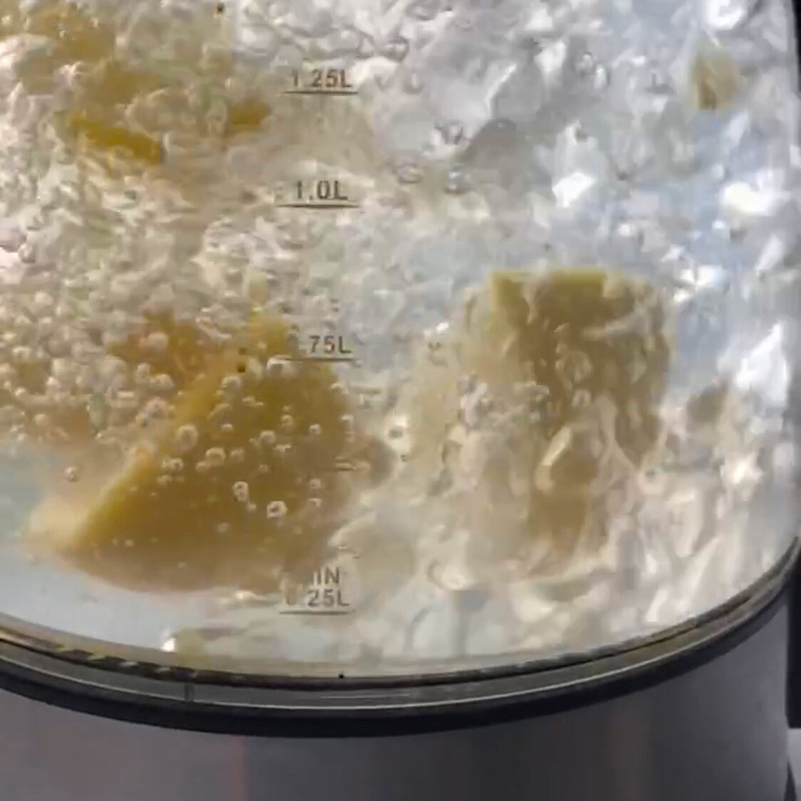 lemons being boiled in kettle